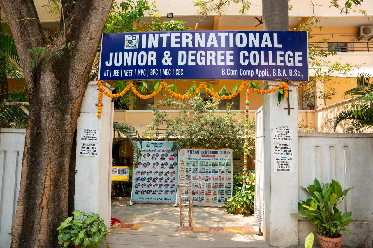 Front entrance of International Junior & Degree College on Old Mumbai Highway, Shaikpet, decorated with marigold garlands